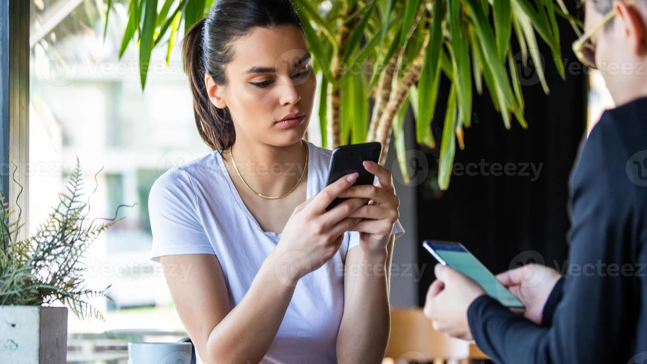 A person with a smartphone in a relaxed setting, representing social media presence and inquiry integration.